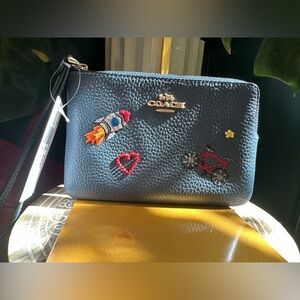 Coach Blue Pebbled Leather Wristlet with Embroidered Motifs NWT